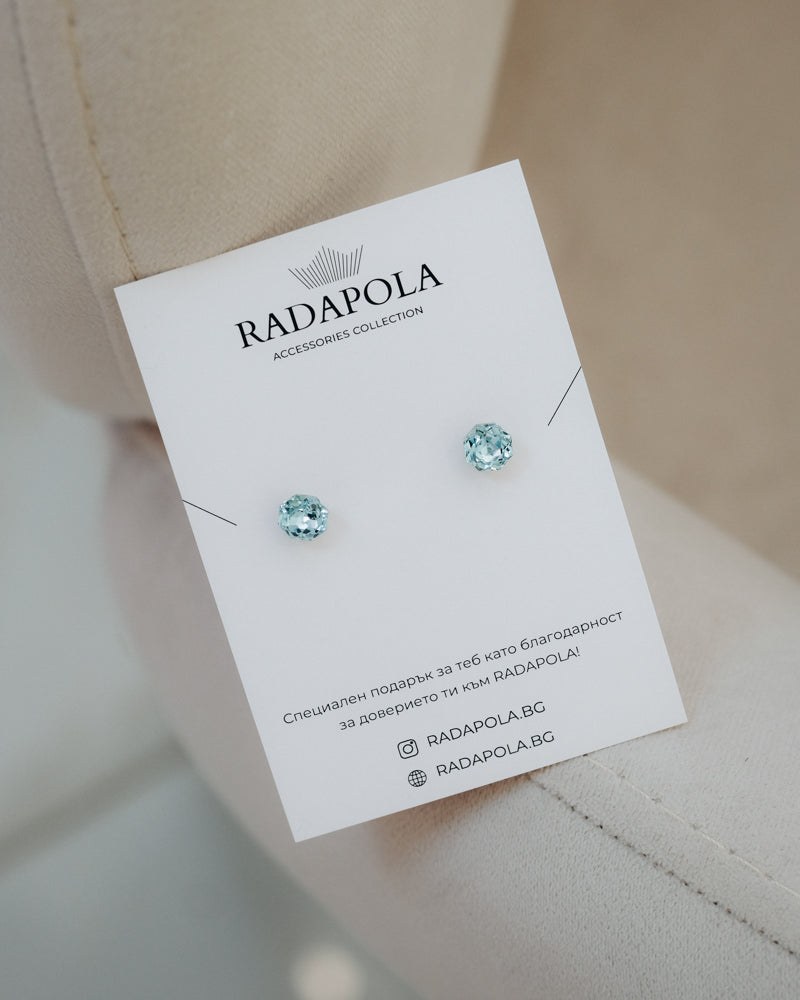 Delicate silver earrings with crystals