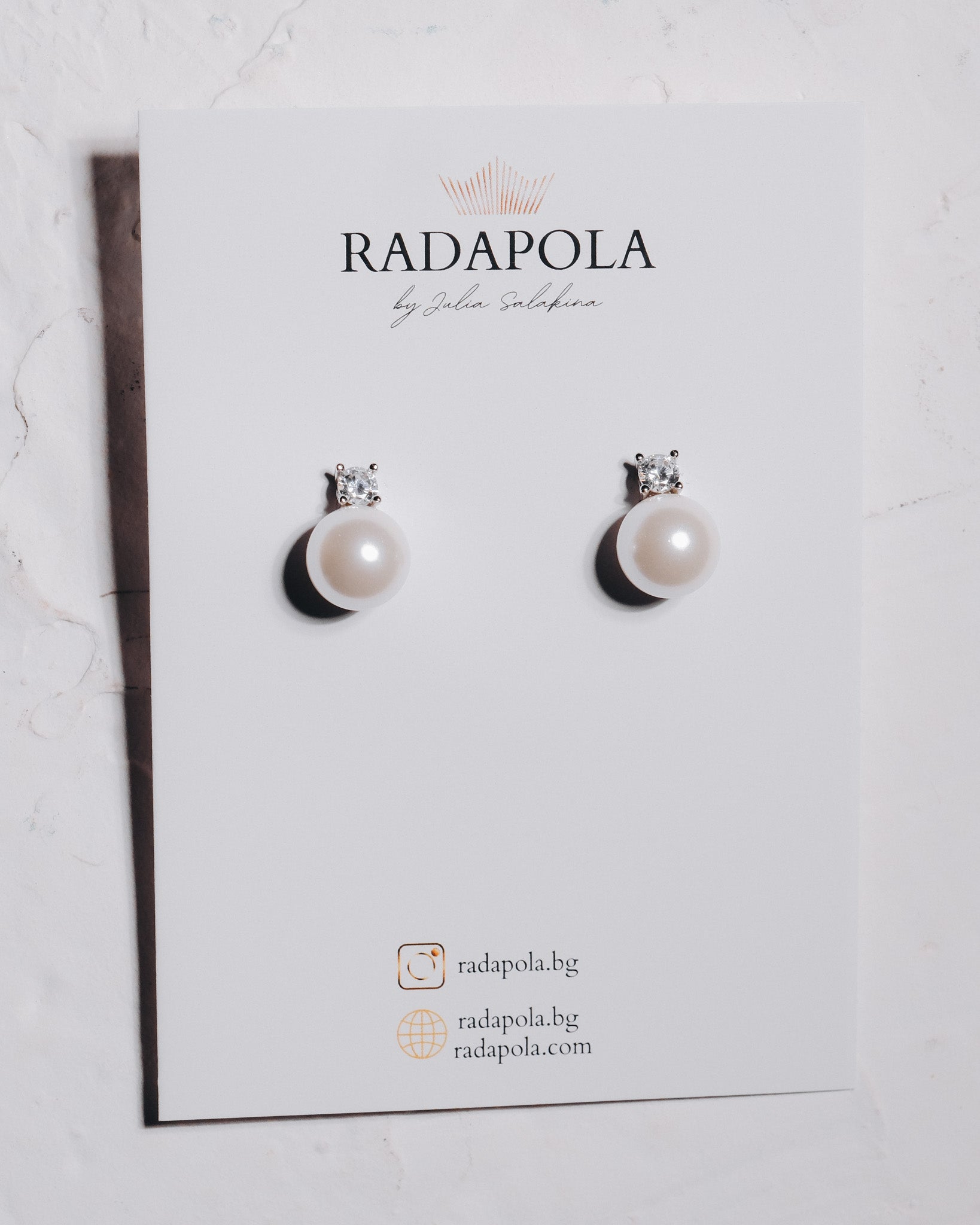 Silver earrings with glass pearls
