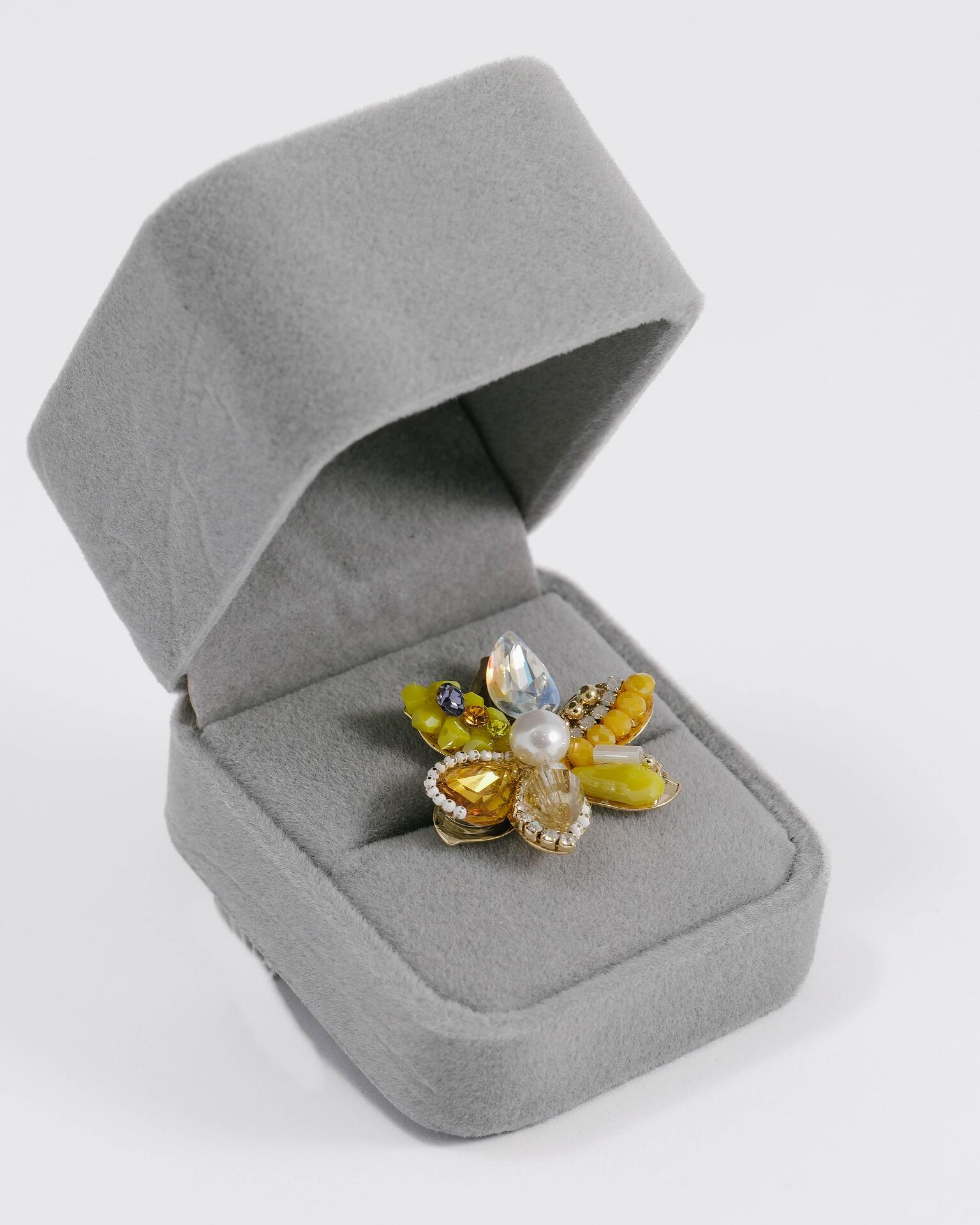 Brooch studded with crystals and beads