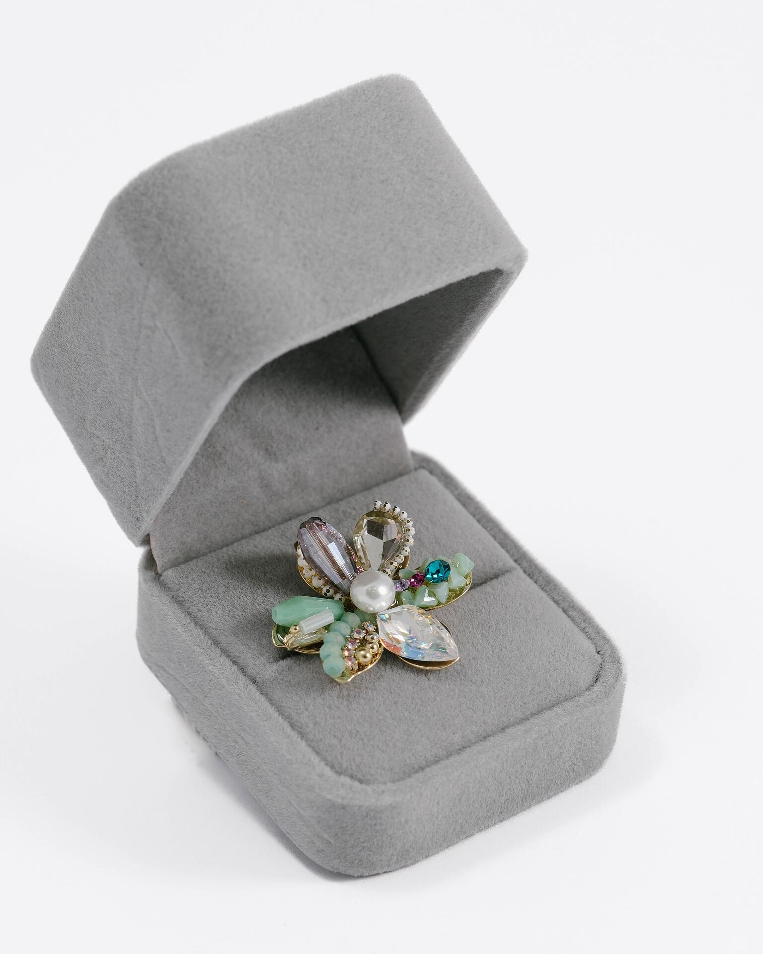 Brooch studded with crystals and beads