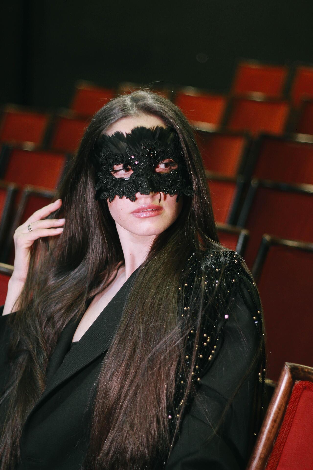 Black stage mask: Overture