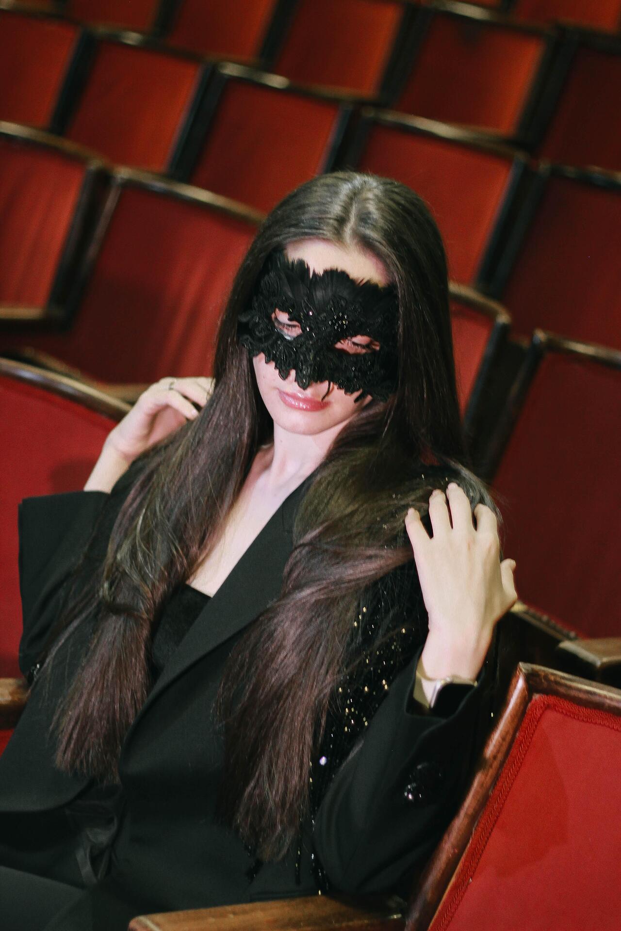 Black stage mask: Overture