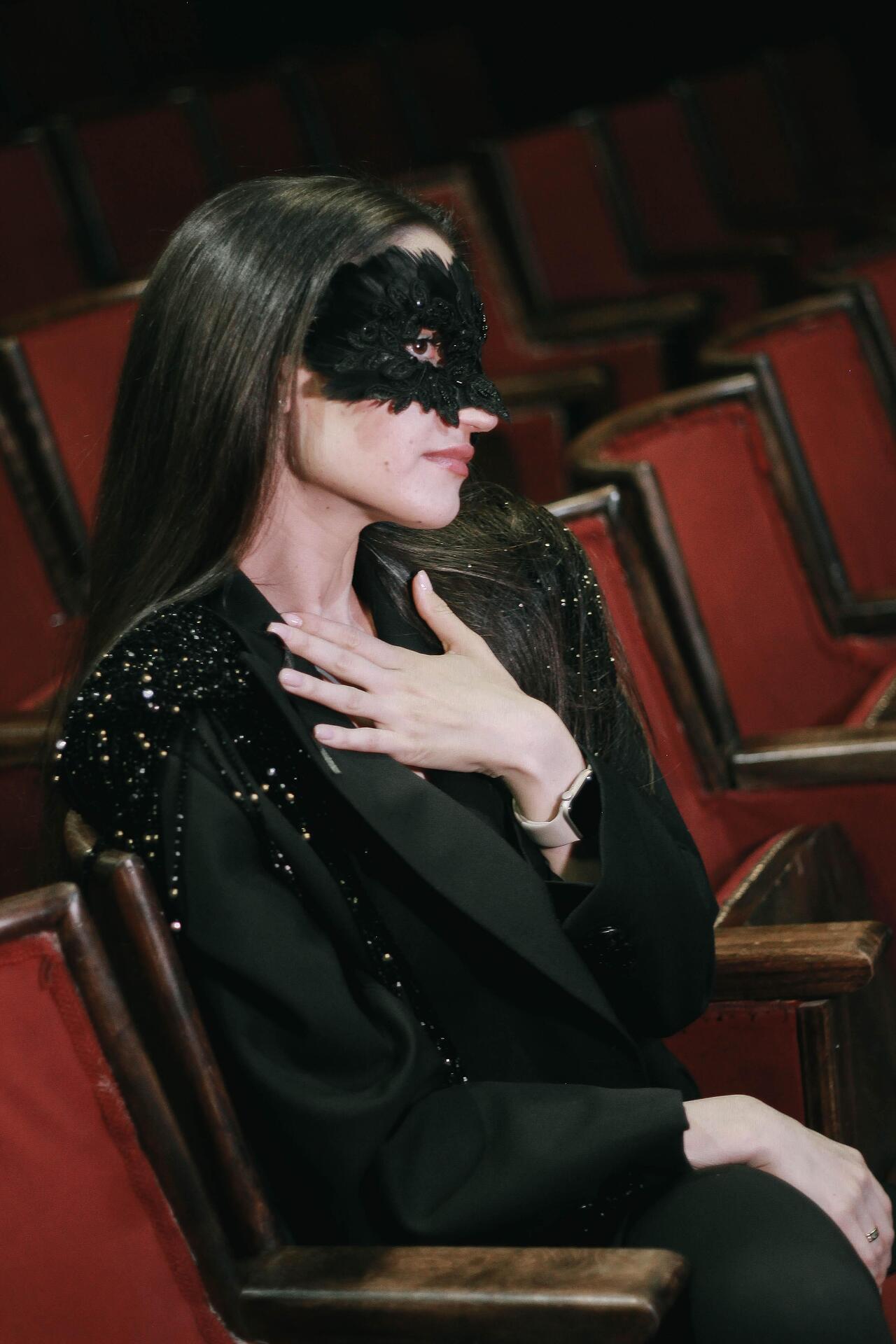 Black stage mask: Overture