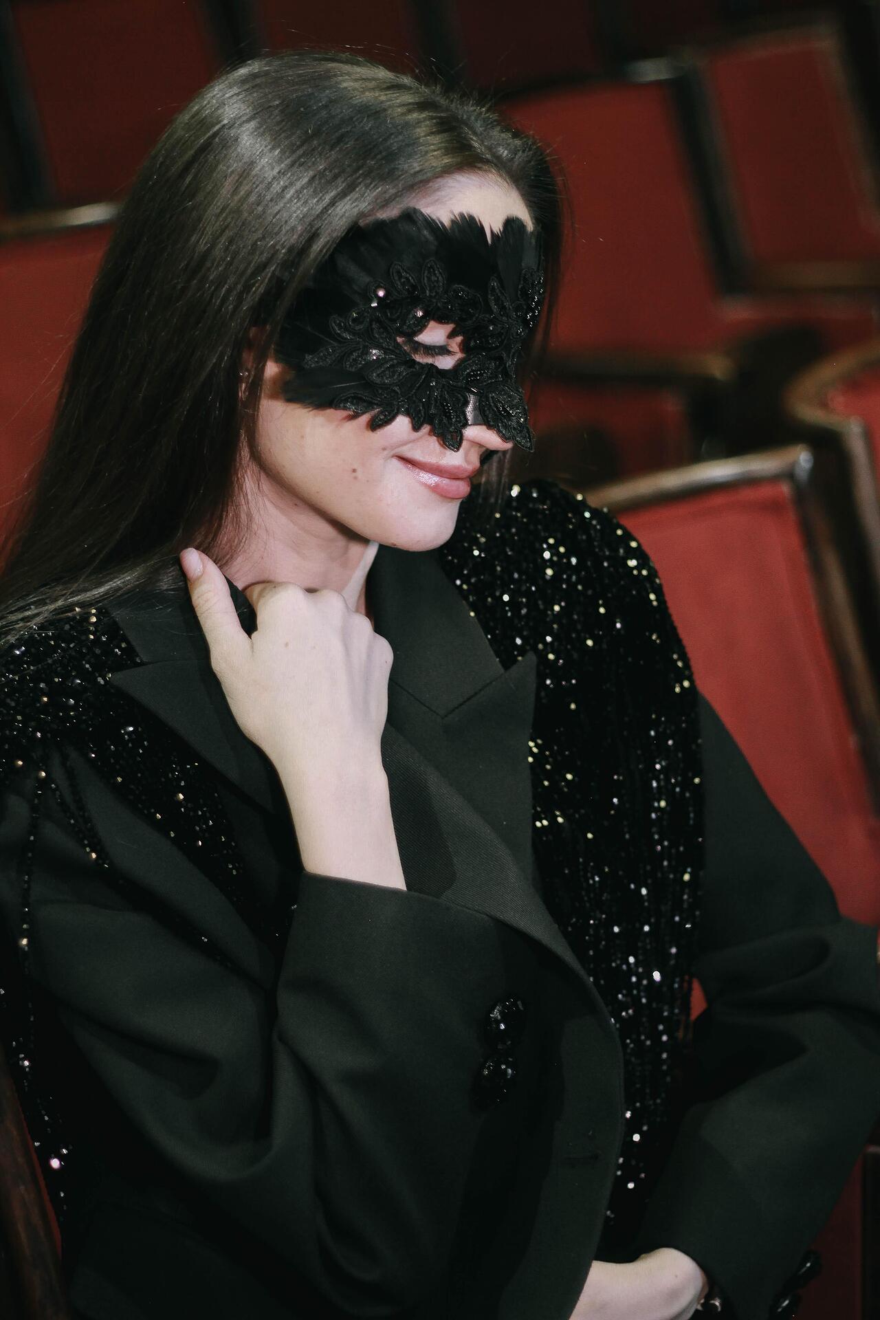 Black stage mask: Overture