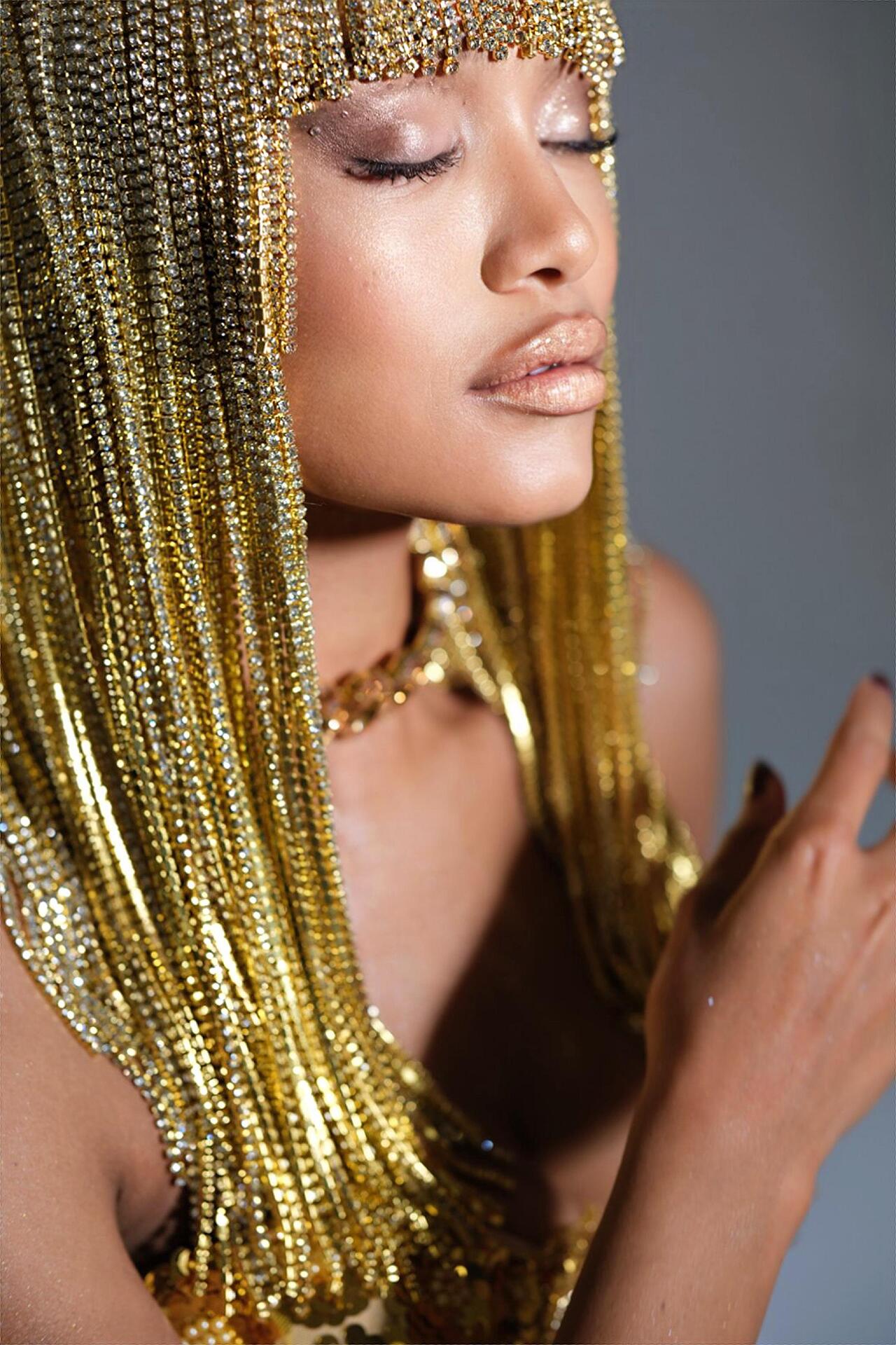 Wig with golden hanging crystals