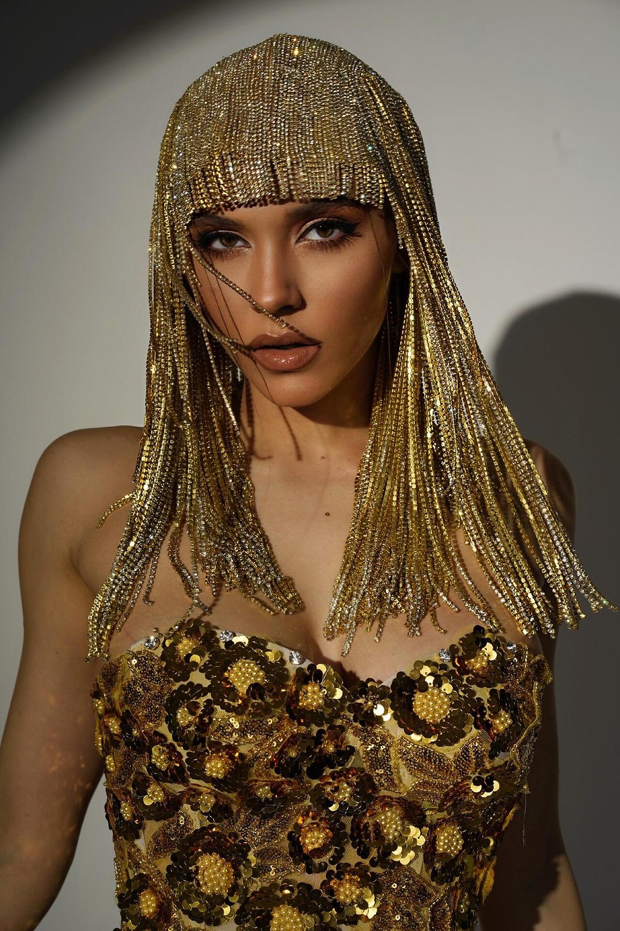 Wig with golden hanging crystals