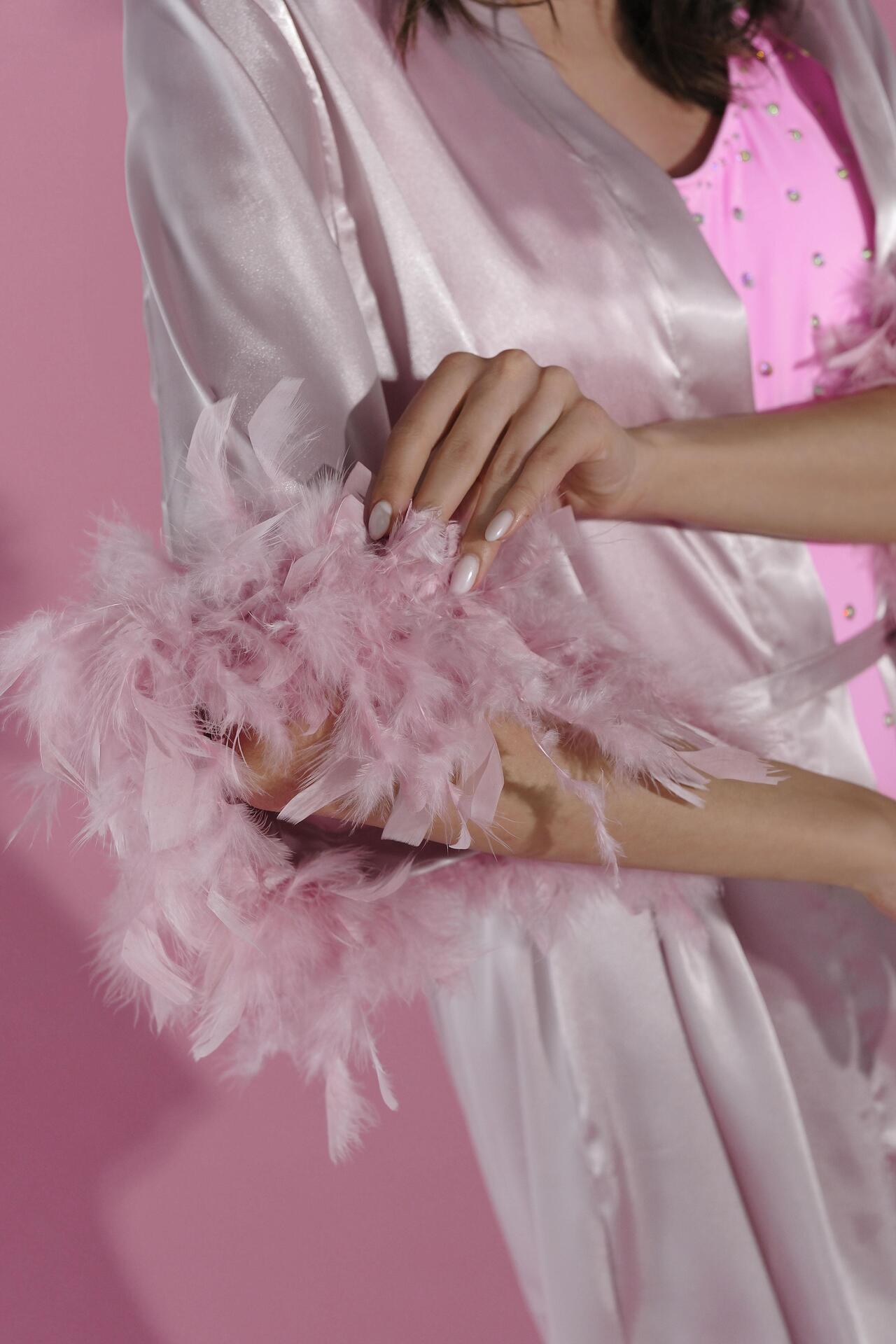 Pink bathrobe with feathers