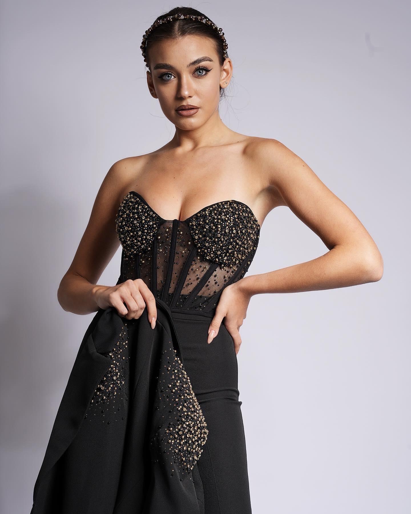 Black jacket with golden crystals and stones