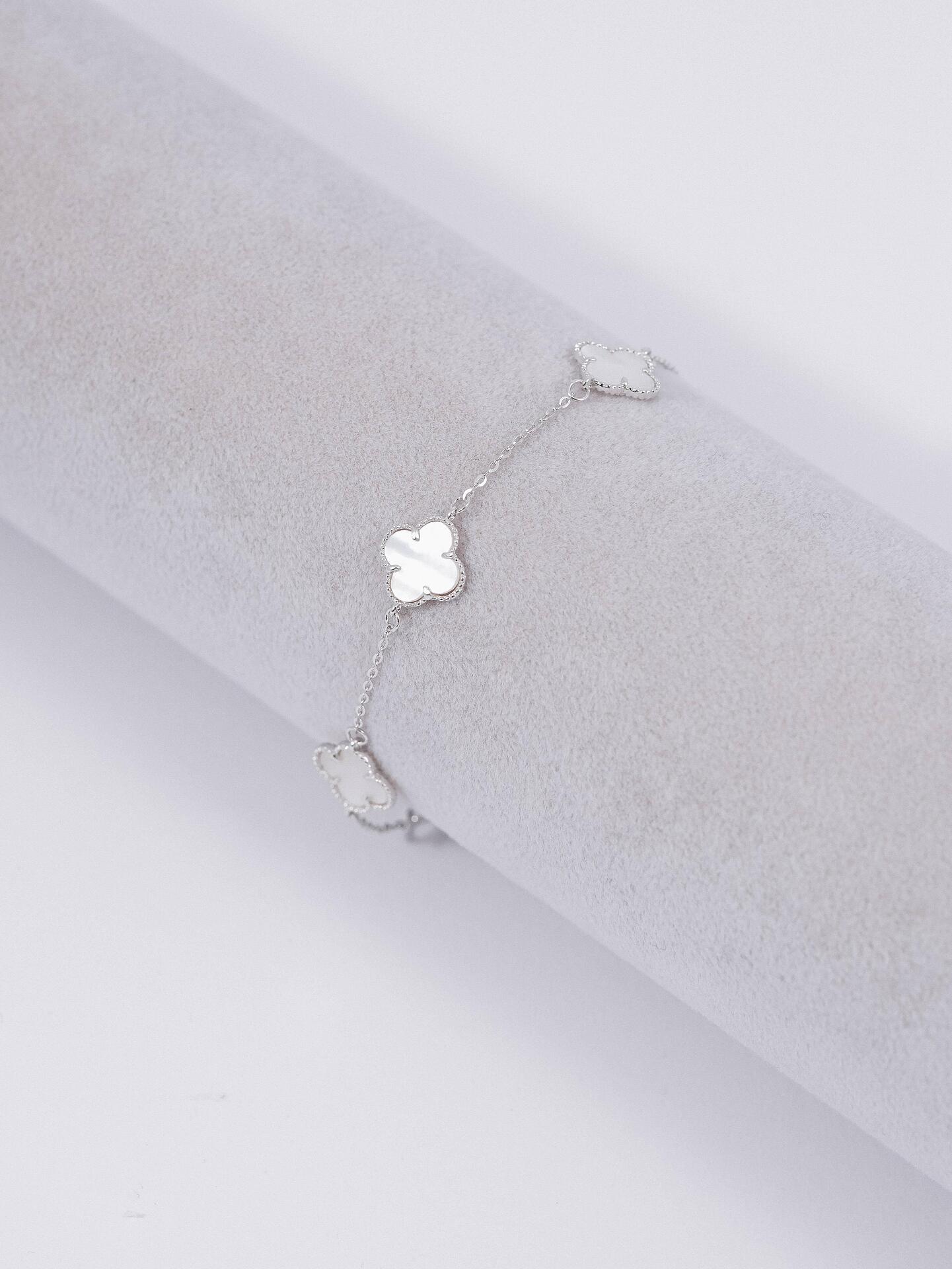 Silver bracelet with clovers