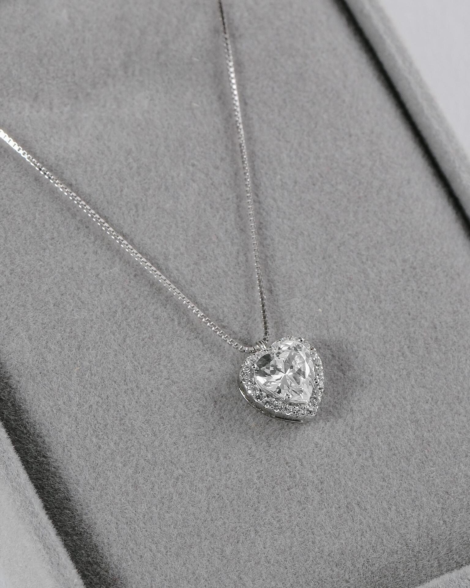 Silver necklace with a heart-shaped pendant