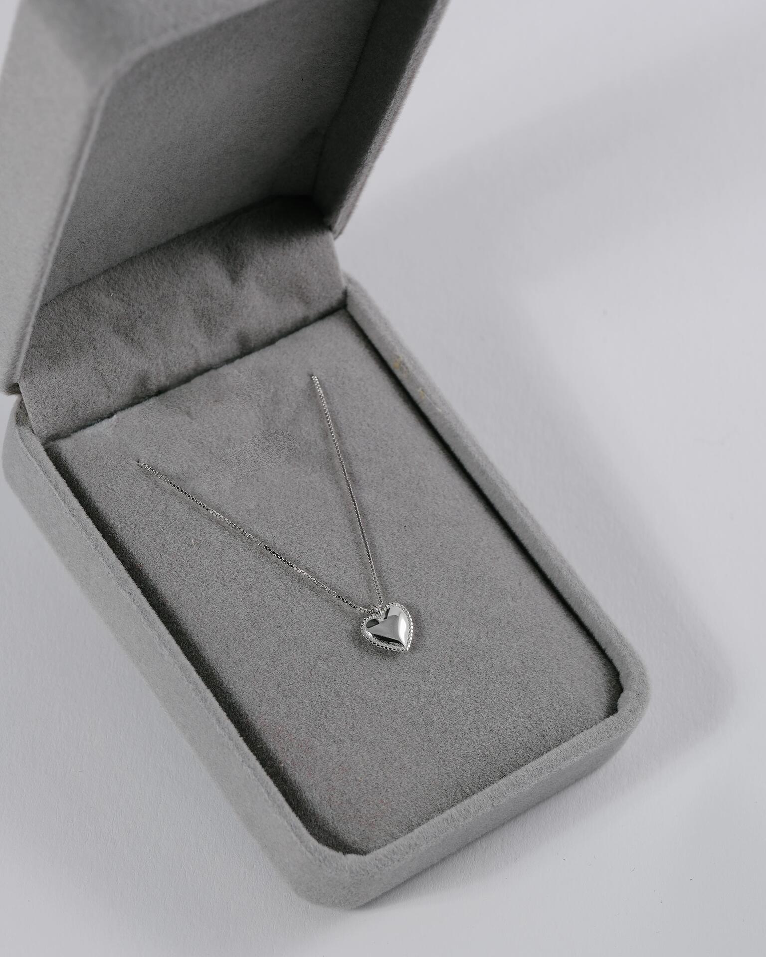 Silver necklace with a heart-shaped pendant