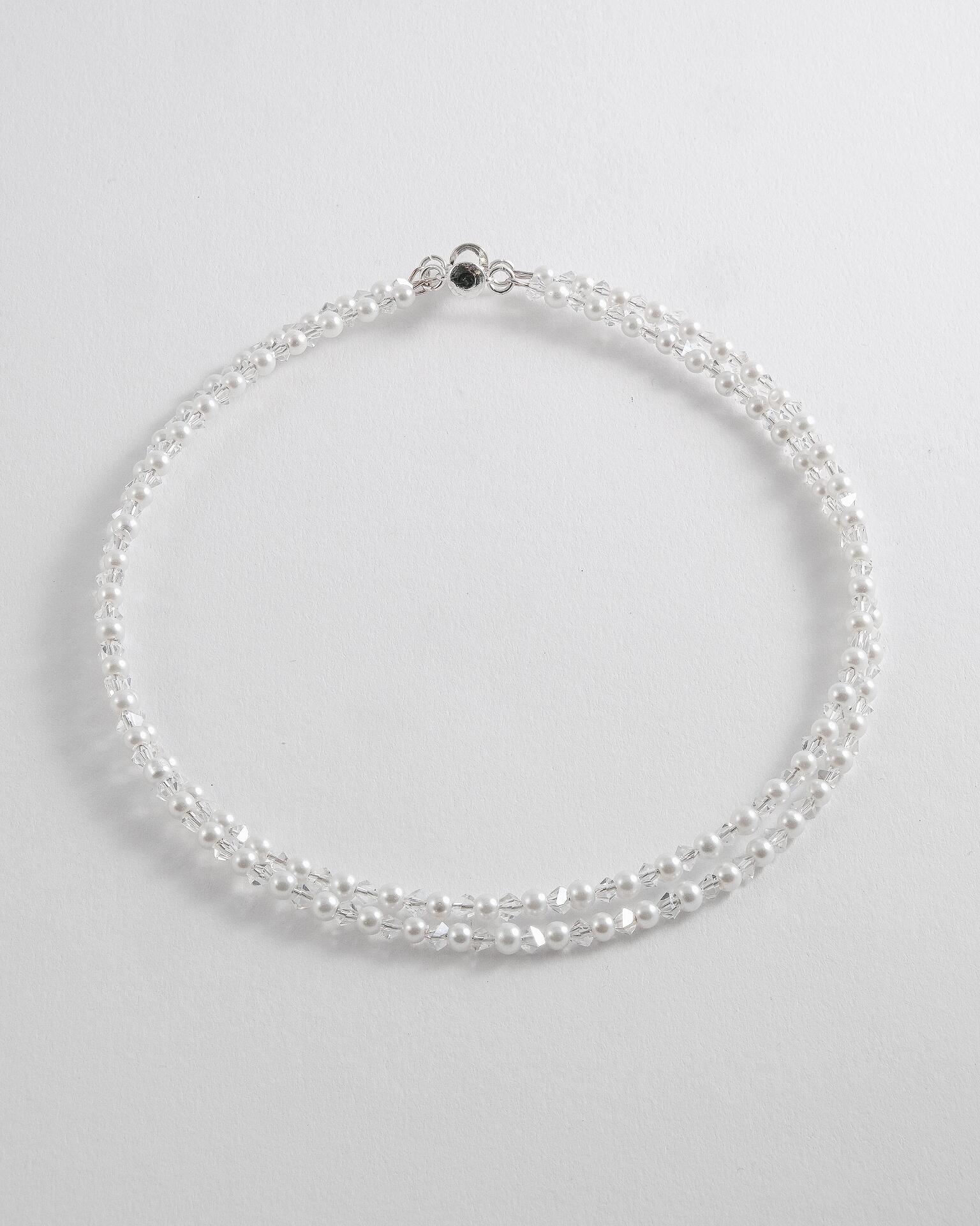 Necklaces with crystals, pearls and stones