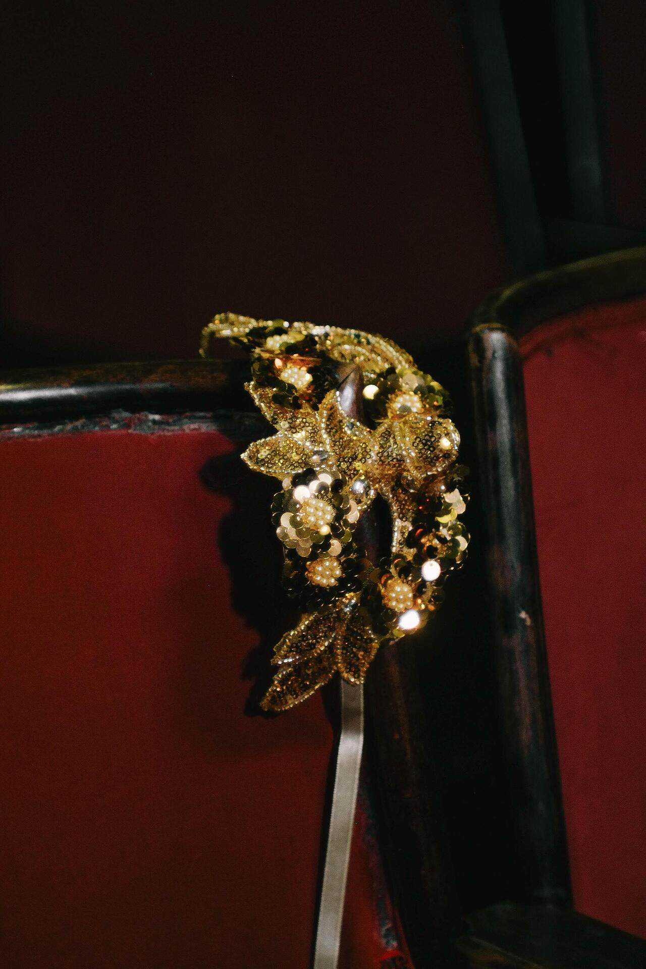 Golden mask with sequins and stones: Enigmatic