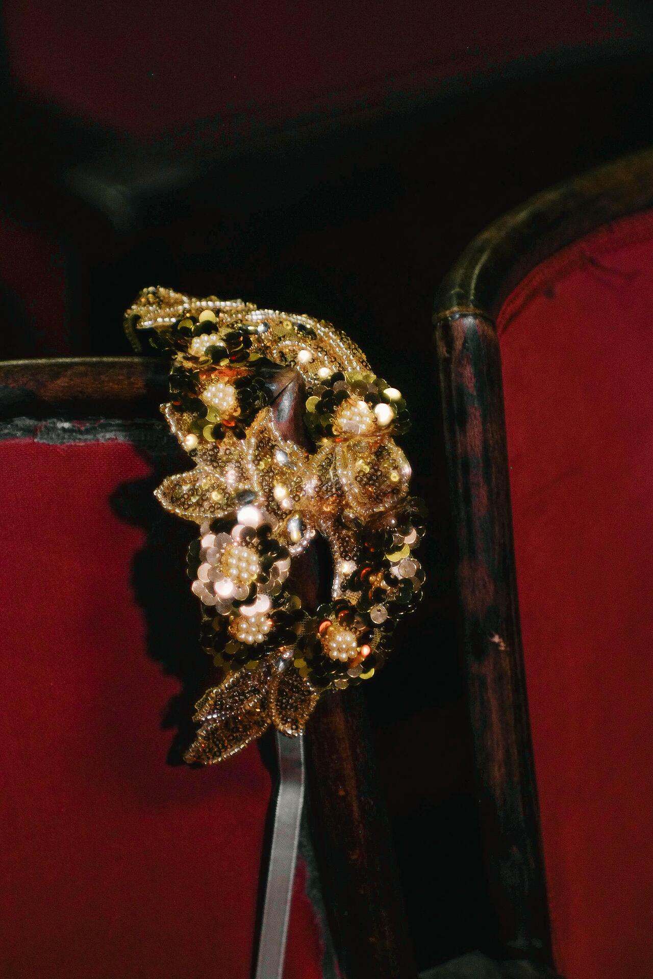 Golden mask with sequins and stones: Enigmatic
