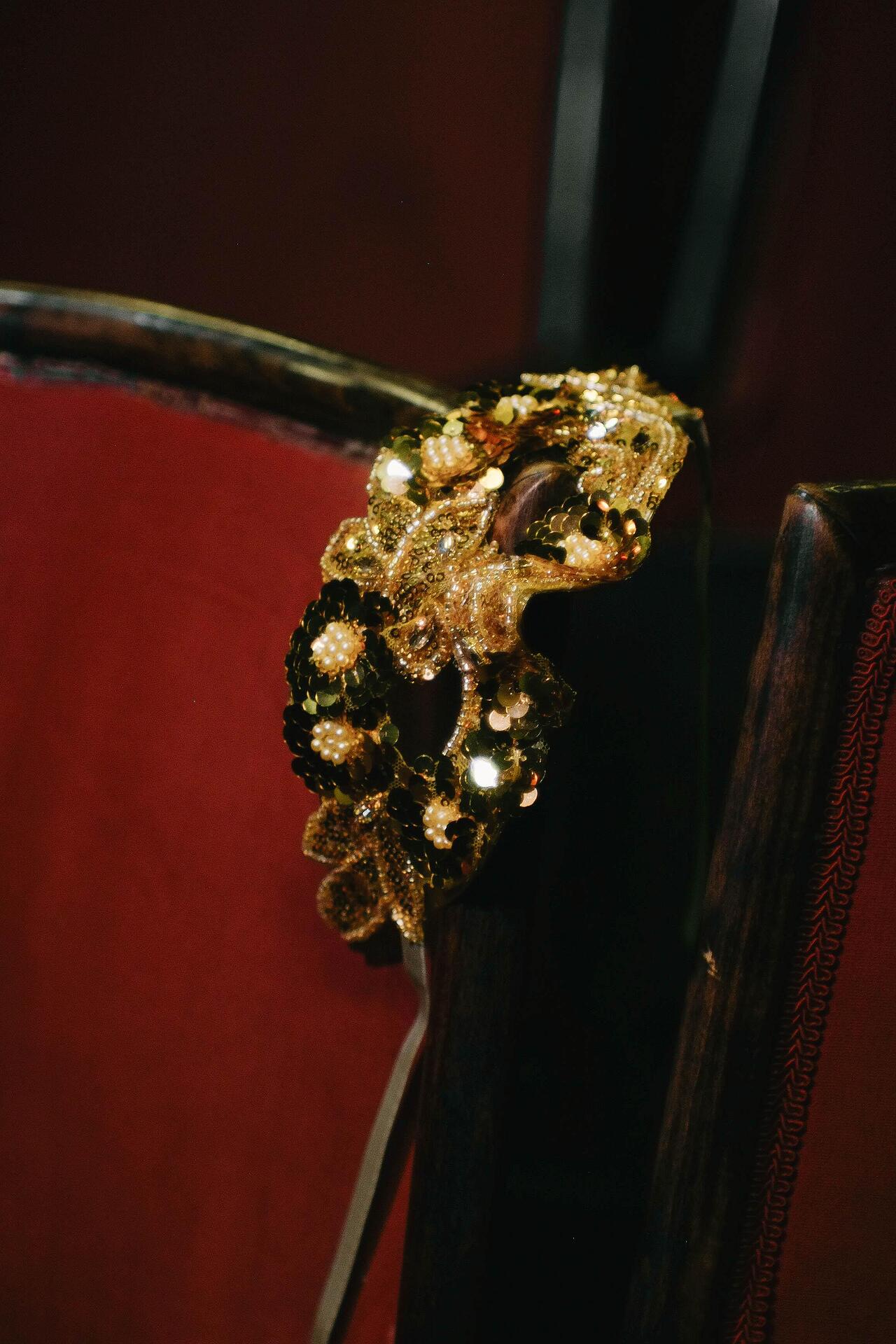 Golden mask with sequins and stones: Enigmatic