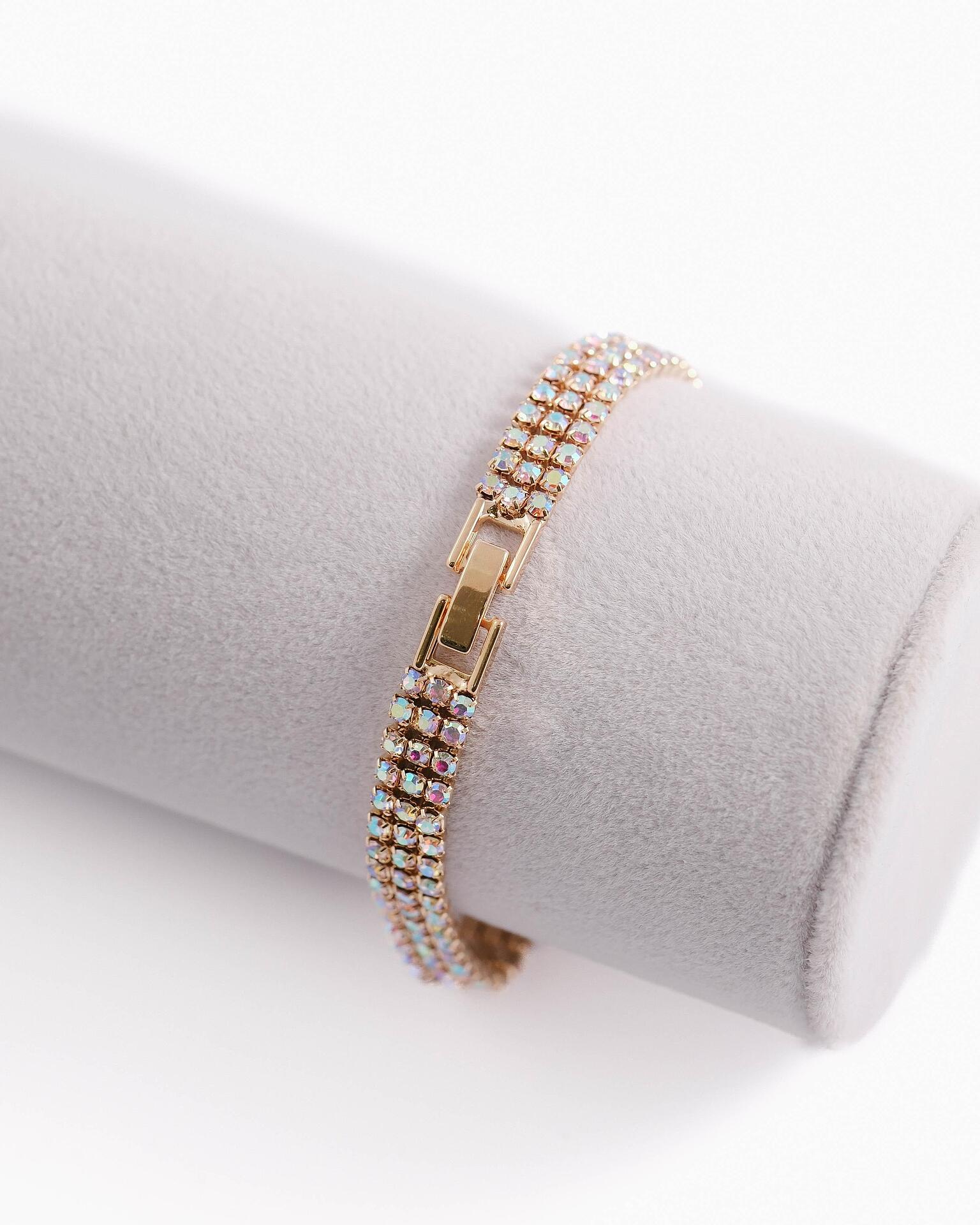 Thin gold bracelet with crystals